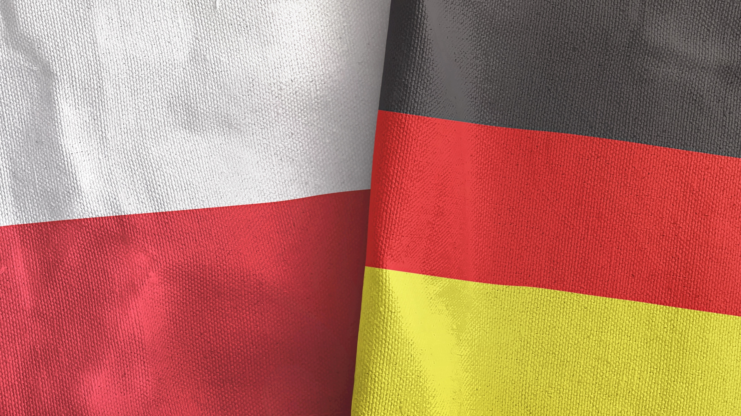 Germany,And,Poland,Two,Folded,Flags,Together,3d,Rendering,3d